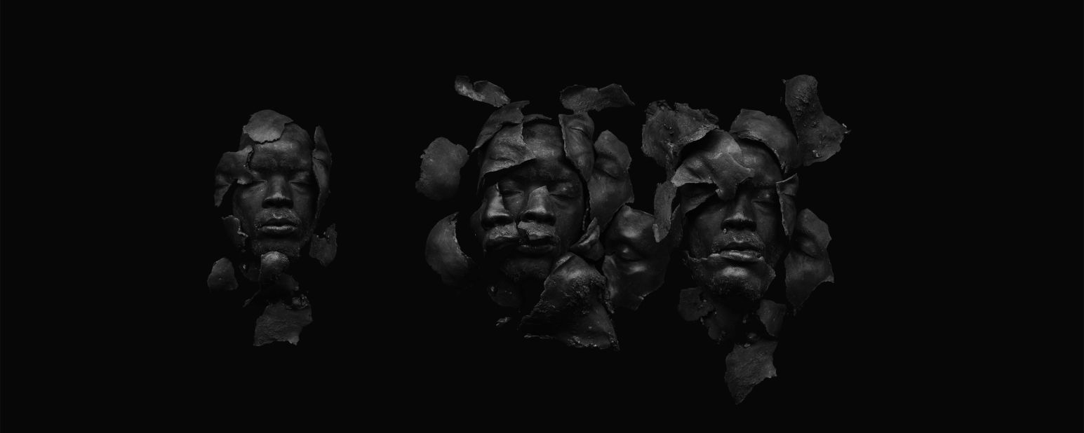 Fossils Black is a work that deceives the eye. Although it looks like a photograph, it is actually a scan. The artist made a cast of his face which was then broken into several pieces and arranged onto a scanner bed. "I grew up in a part of Soweto that witnessed a lot of conflict" he says. The 1990s saw bloody clashes between followers of the  African National Congress (ANC) and Inkatha Freedom Party (IFP). 