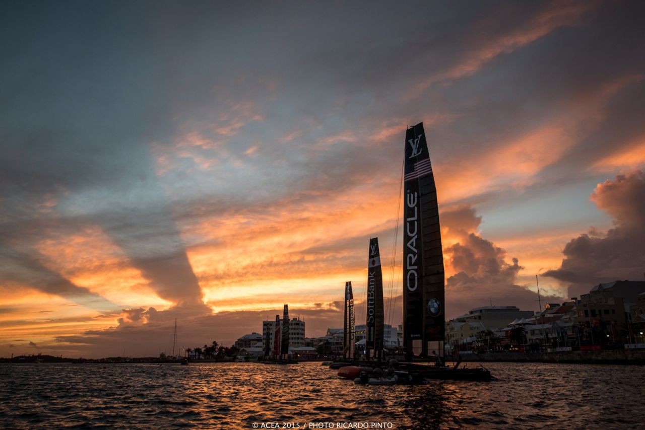 The sun sets over Hamilton, the capital of Bermuda, after a training day last year during the America's Cup World Series. Next year's finals may give its economy a $250 million boost, local organizers say. 