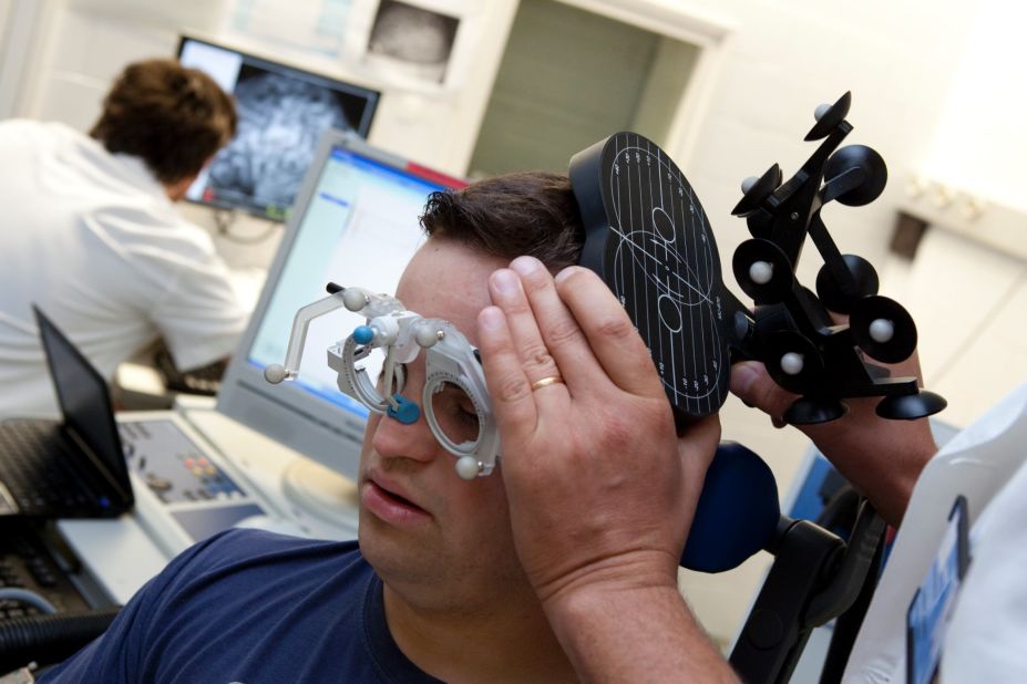Scientists at the CRG-Center for Genomic Regulation in Spain trialed the compound EGCG, found in green tea extract, in patients with Down syndrome to see if it could reduce the overexpression of genes that cause the disease symptoms. Pictured, a trial participant has his brain scanned to monitor activity.