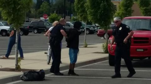The suspect was roped by the ankles.