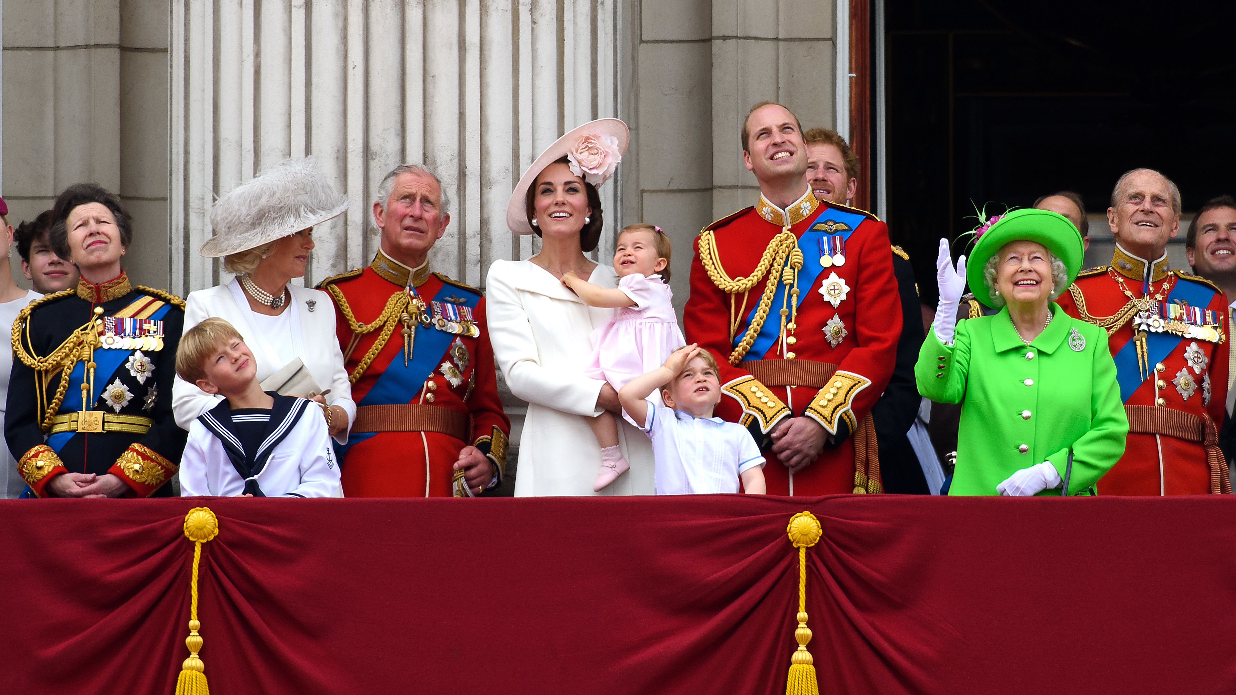 Members of the royal family gather on a balcony in June 2016 during celebrations marking the 90th birthday of Queen Elizabeth II. Catherine is holding Charlotte.