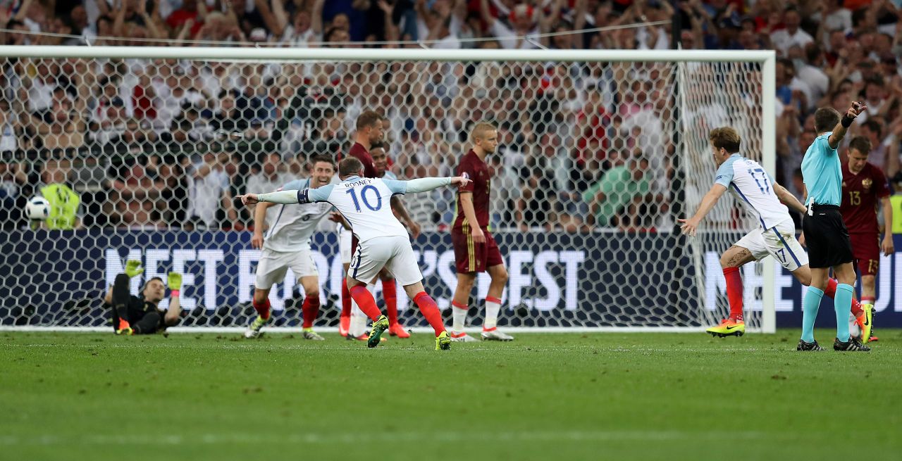 England midfielder Eric Dier, third right,  celebrates after scoring the match's first goal. 