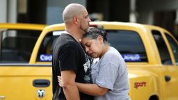 Ray Rivera, a DJ at Pulse Orlando nightclub, is consoled by a friend outside of the Orlando Police Department after a shooting that killed at least 50 people and injured 53 on Sunday, June 12. 