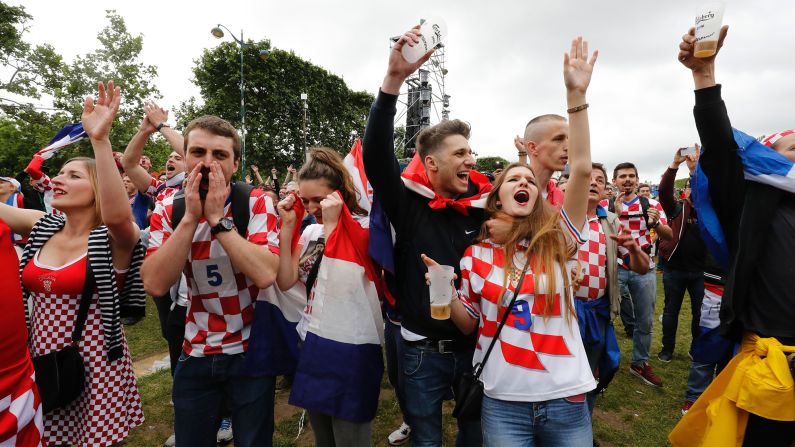 Croatian supporters in a Paris fan zone celebrate their team's victory.
