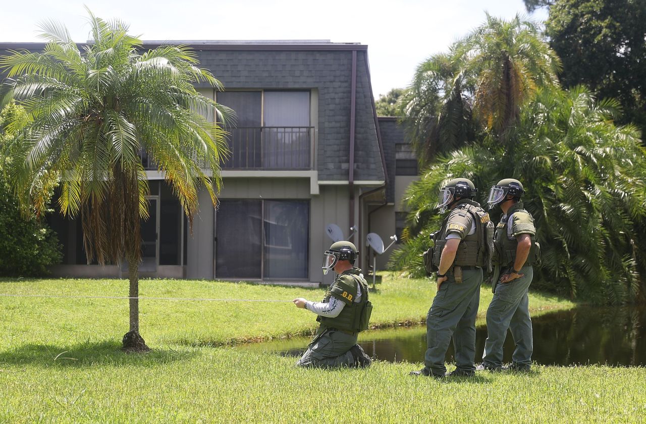 A bomb disposal unit checks for explosives around the apartment building where Mateen is believed to have lived in Fort Pierce, Florida. 