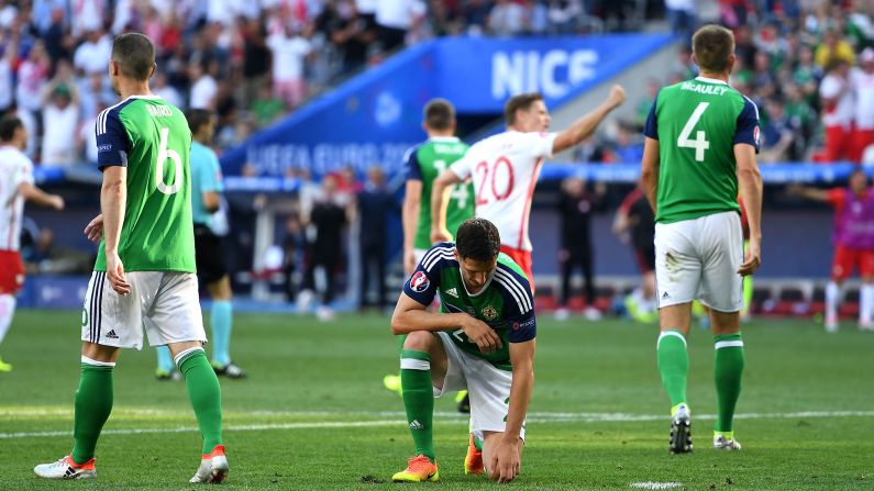 Craig Cathcart appears dejected after Milik's goal, which came in the 51st minute.