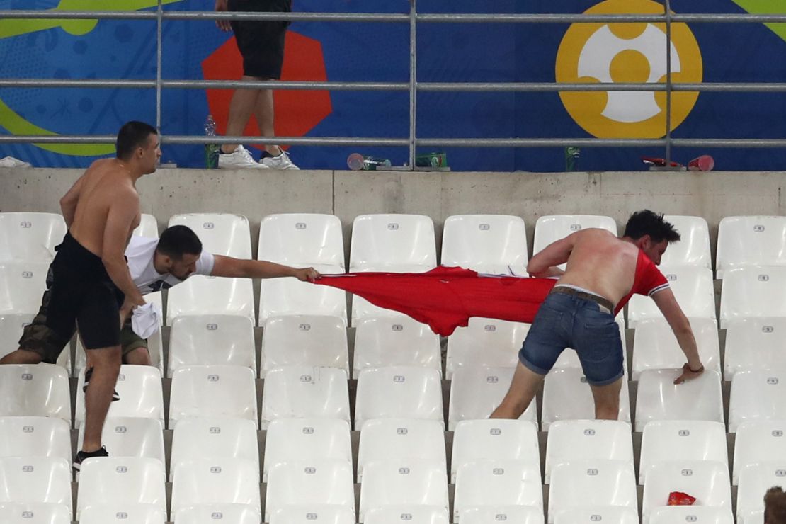 Russia and England fans clash in Marseille.