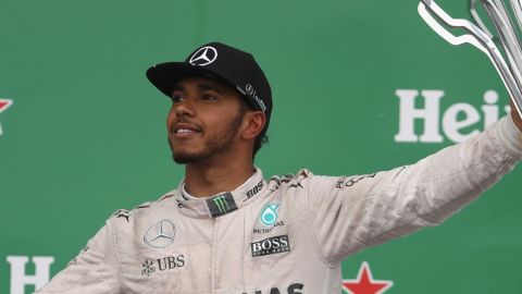 Lewis Hamilton celebrates winning the Canadian F1 Grand Prix for the fifth time. 