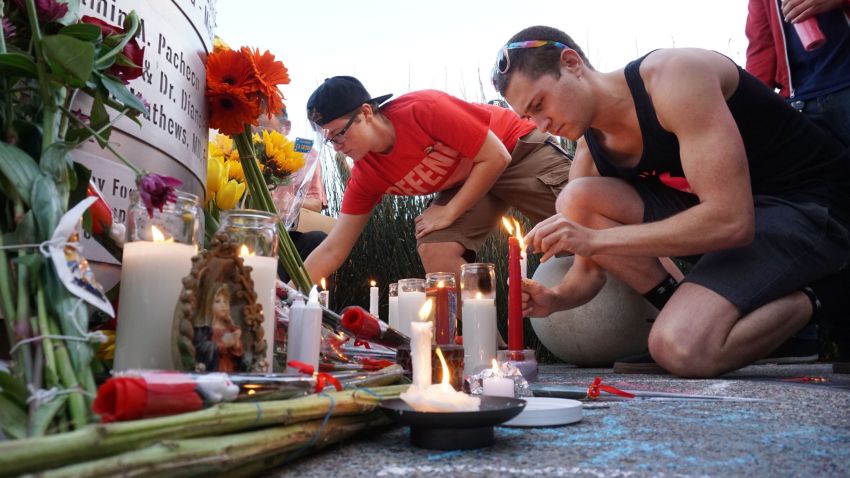 Mourners pay tribute to the victims of the Orlando shooting during a memorial service in San Diego, California in San Diego, California on June 12, 2016.
Fifty people died when a gunman allegedly inspired by the Islamic State group opened fire inside a gay nightclub in Florida, in the worst terror attack on US soil since September 11, 2001. 