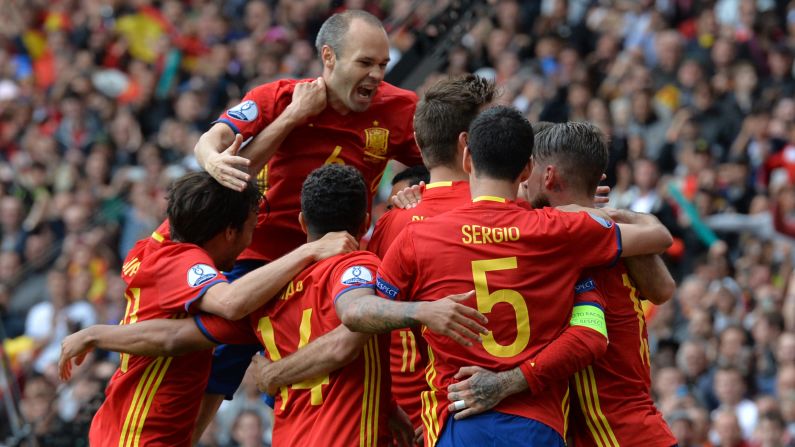 Spanish players celebrate after Pique's goal, which came late in the match in the 87th minute.