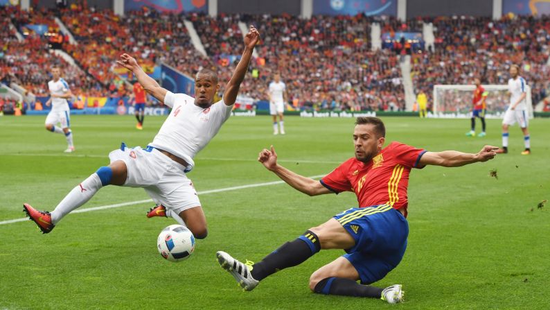 Czech defender Theodor Gebre Selassie, left, tries to block a pass by Spain's Jordi Alba.