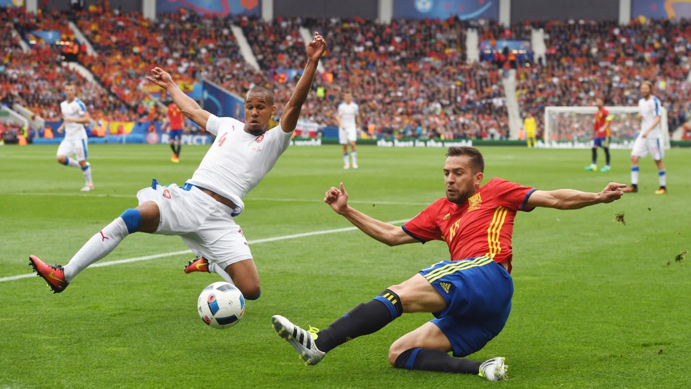 Czech defender Theodor Gebre Selassie, left, tries to block a pass by Spain's Jordi Alba.