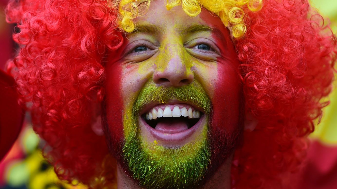 A Spain supporter smiles ahead of the match in Toulouse, France.