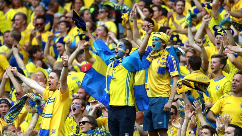 Sweden supporters celebrate the goal at the Stade de France just north of Paris.