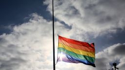 A pride flag stands a half mast during a memorial service in San Diego, California on June 12, 2016, for the victims of the Orlando Nighclub shooting. Fifty people died when a gunman allegedly inspired by the Islamic State group opened fire inside a gay nightclub in Florida, in the worst terror attack on US soil since September 11, 2001. / AFP / Sandy Huffaker        (Photo credit should read SANDY HUFFAKER/AFP/Getty Images)