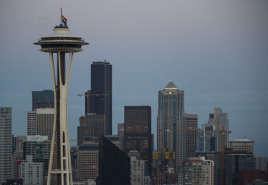 A rainbow flag flies at half-staff on the Space Needle in Seattle on June 12.