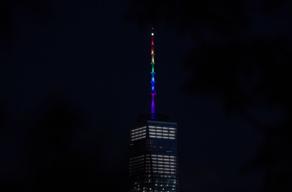 One World Trade Center is lit in rainbow colors June 12 in New York.