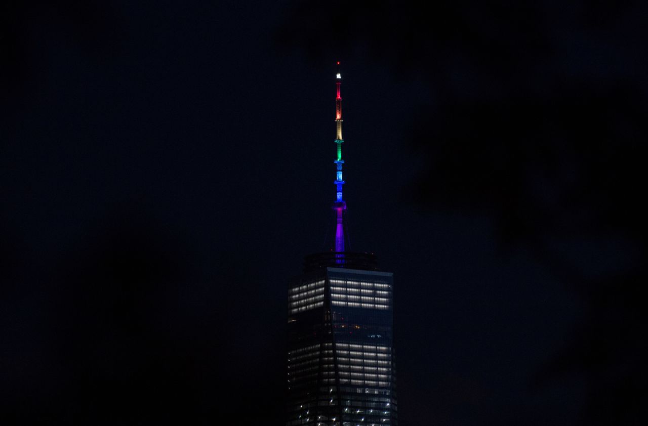 One World Trade Center is lit in rainbow colors June 12 in New York.