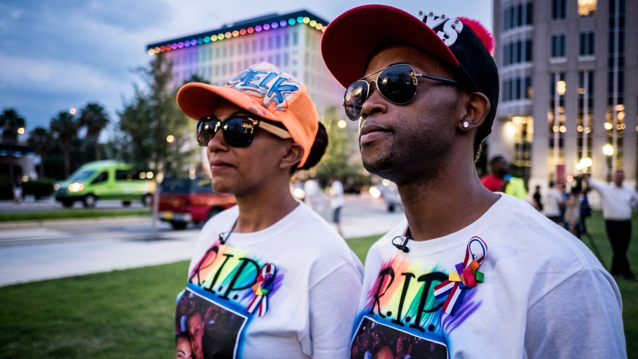 Family and friends of shooting victims Leroy Valentin Fernandez and Xavier Emmanuel Serrano Rosado attend the vigil. They were wearing matching "RIP Eman & Roy" shirts. <a href="http://www.cnn.com/interactive/2016/06/us/orlando-attack-victims/" target="_blank">Learn more about the victims</a>.