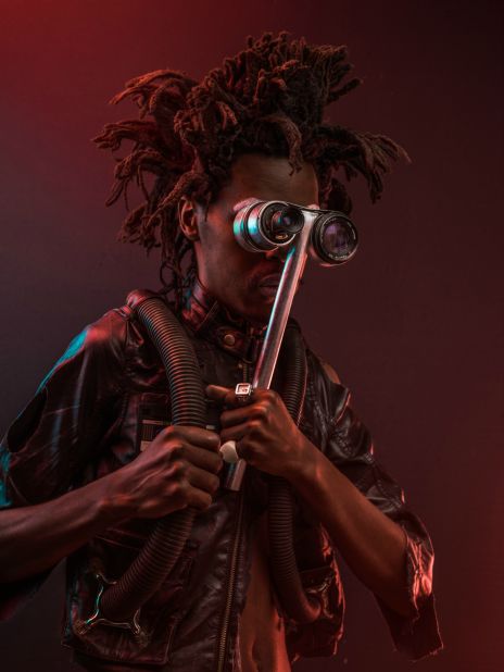 Karanja 'the mole' Jere normally operates underground with his modified underground breathing suite. His hair is designed to appear like a rodent burrowing through the soil and his spectacles are telescopic, able to see close to one kilometer away.