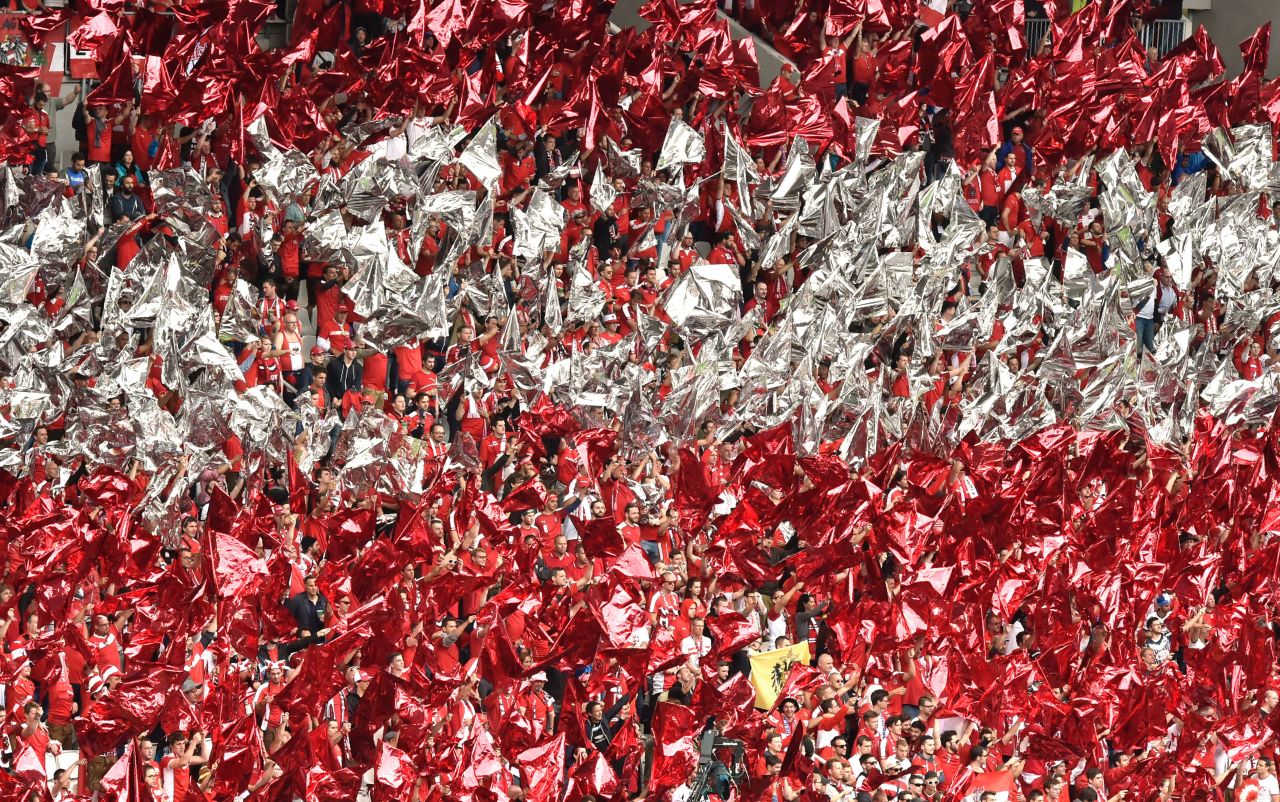 Austria fans wave their colors in the stadium before the match.