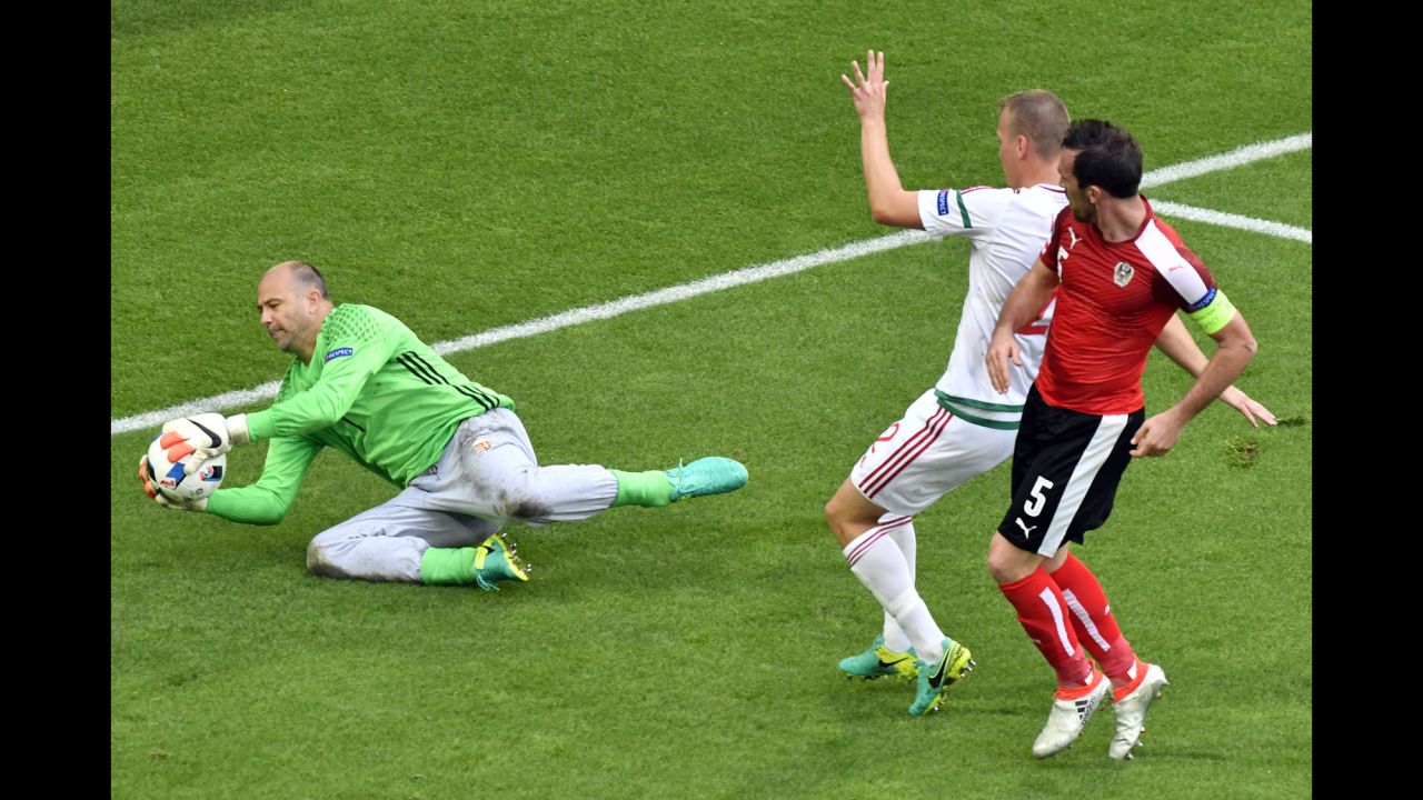Hungary goalkeeper Gabor Kiraly makes a save. The 40-year-old is now the oldest player ever to compete in the Euros.