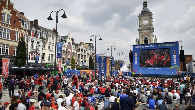 Fans watch a Euro 2016 match on a giant screen in Lens, France, on Saturday, June 11. The small city -- population 34,190 -- is expecting 50,000 fans for the England-Wales match on Thursday, and authorities are bolstering security in light of the influx and recent fan violence in Marseille.