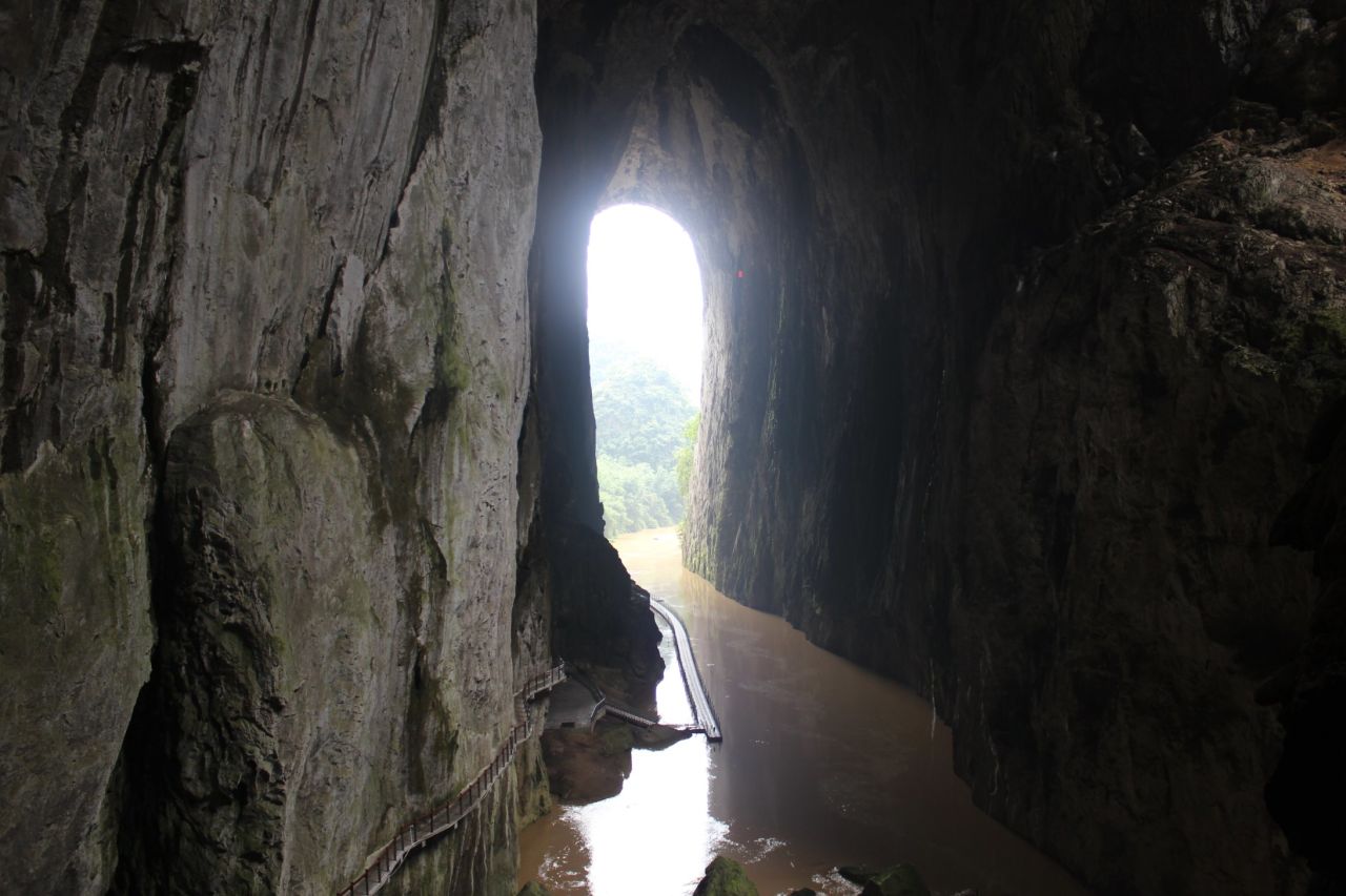 The less intrepid can reach the arch by hiking a path through a sinkhole. 