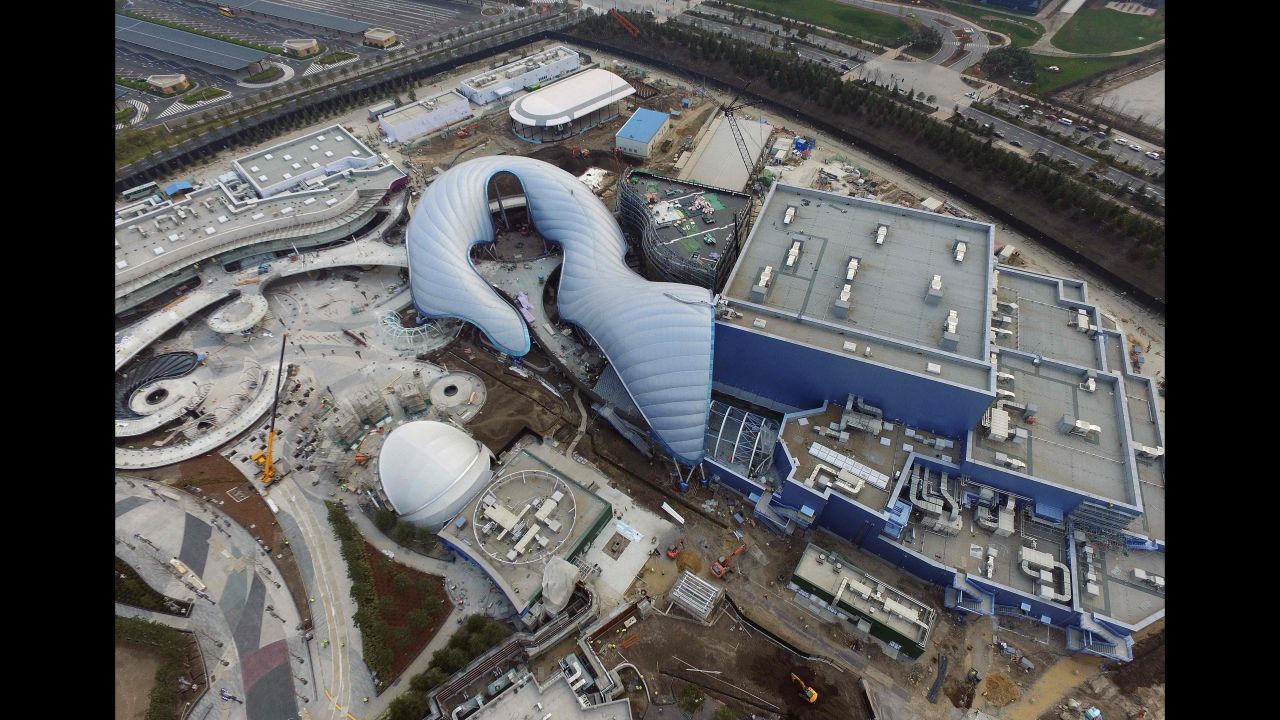One of the highlights unique to Shanghai is a new TRON Lightcycle Power Run coaster, seen here under construction. The park also includes reworkings of Disney classics, such as the Pirates of the Caribbean ride. 