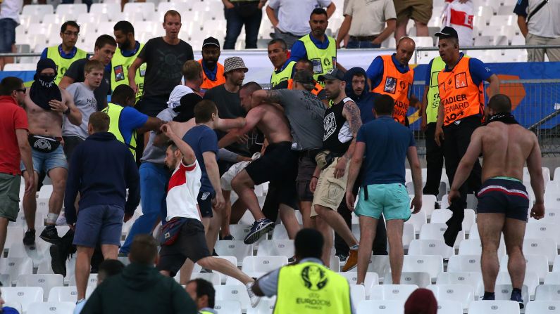 Fans clash in the Stade Velodrome after the England-Russia match in Marseille.