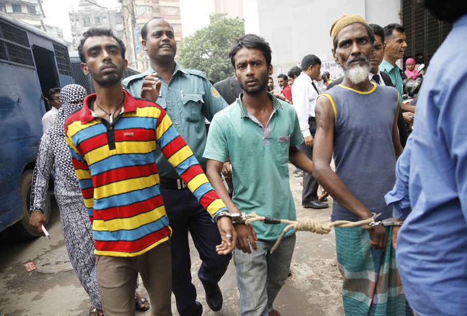 Bangladeshi police escort arrested men  in Dhaka on June 12, 2016. Over 14,000 people, including suspected ordinary criminals, have been detained after police launched a controversial anti-militant drive across the Muslim-majority nation following a spate of gruesome murders. 