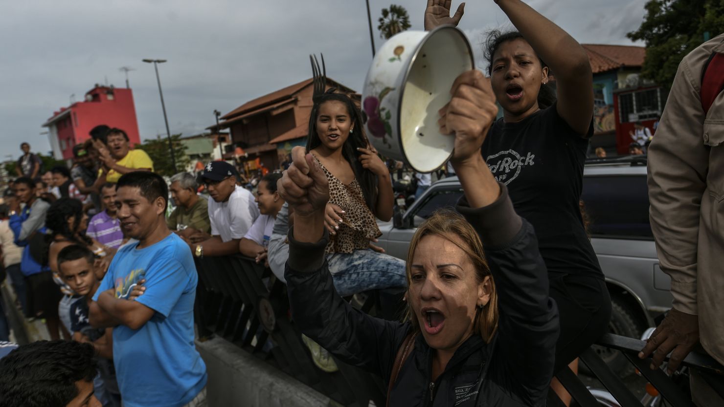 Residents of the Catia neighborhood rally to protest a lack of food in Caracas on June 14. 
