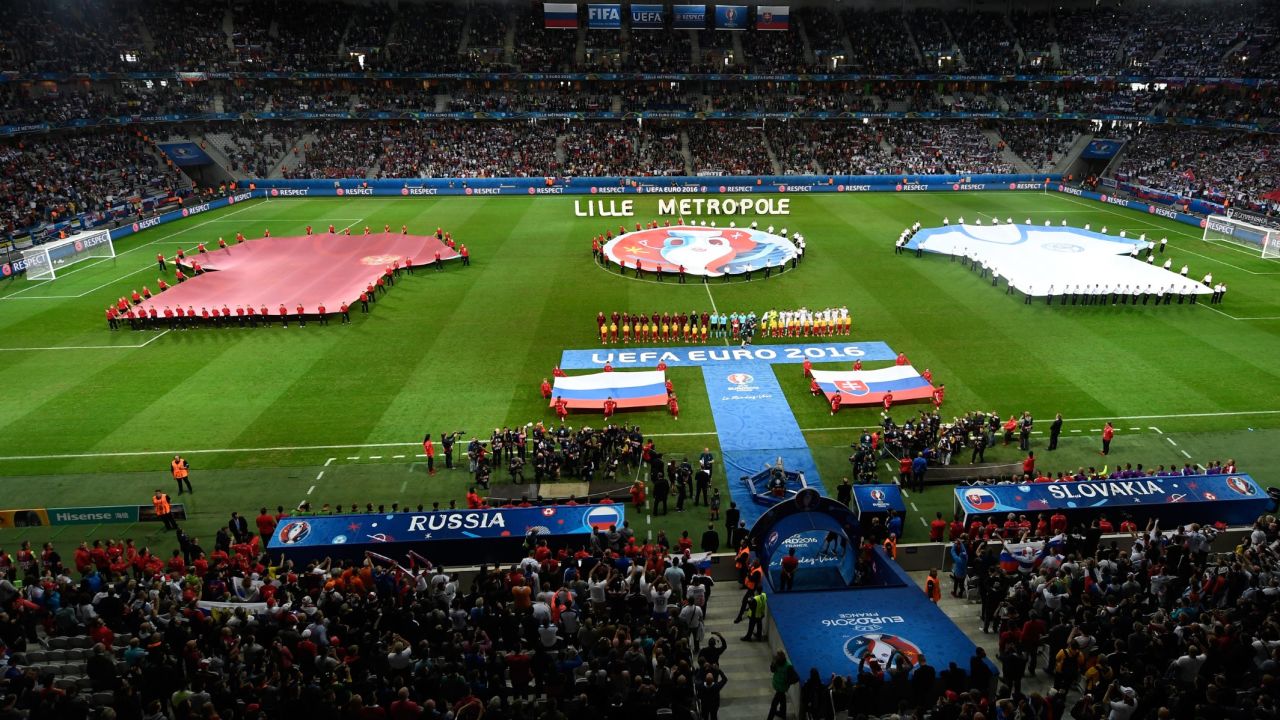 The teams line up during the pre-match ceremony.