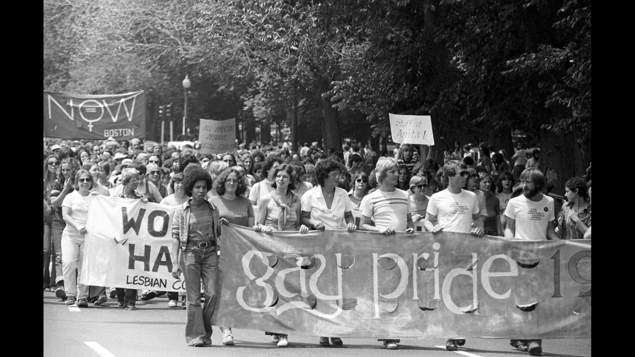 A crowd holds banners as they march in the Back Bay neighborhood of Boston in 1970.