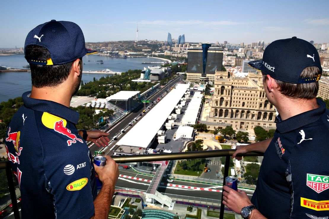 Red Bull Racing's Daniel Ricciardo and Max Verstappen look down on the Baku City Circuit