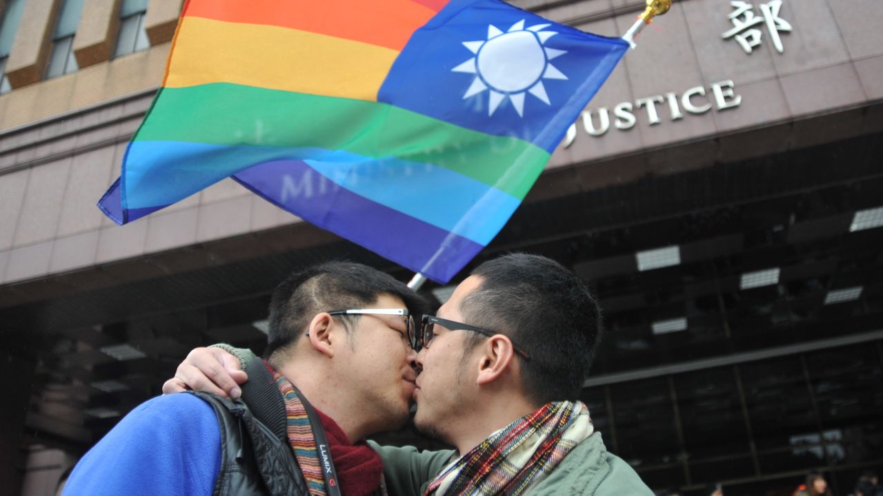 A gay couple kiss during a protest in front of the Ministry of Justice on Valentine's Day in Taipei in 2014. Dozens of protesters gathered to demand same-sex marriages.