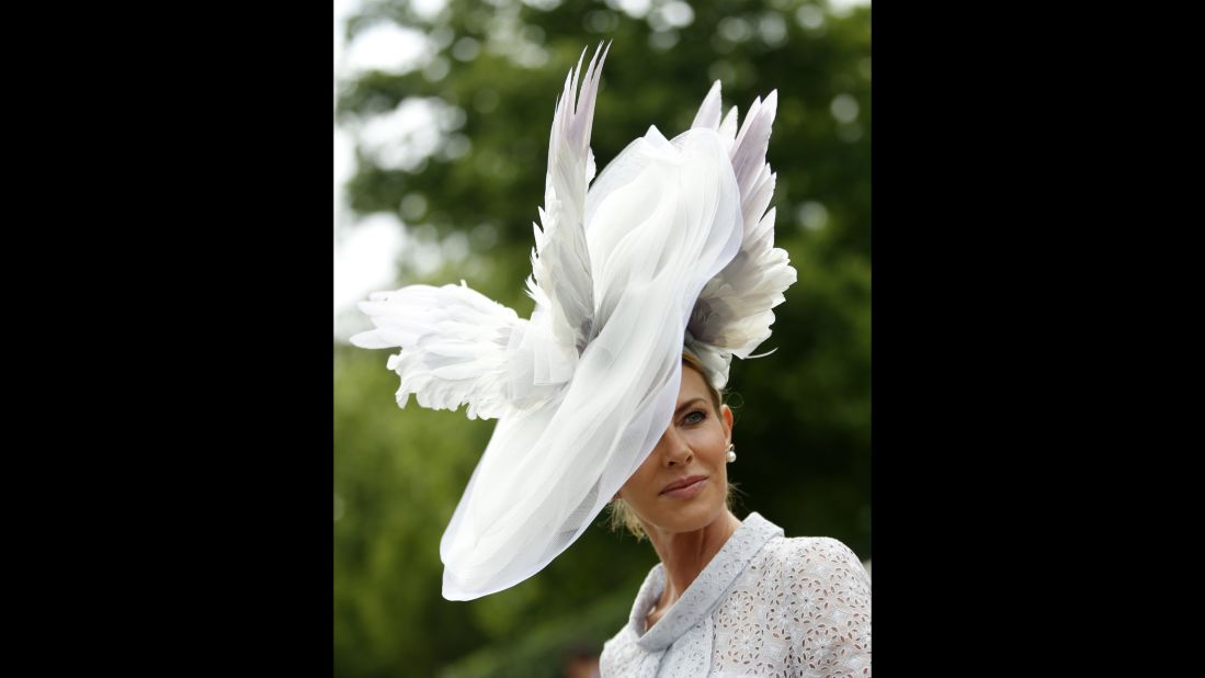 Belinda Studwick sports an enormous winged hat. 