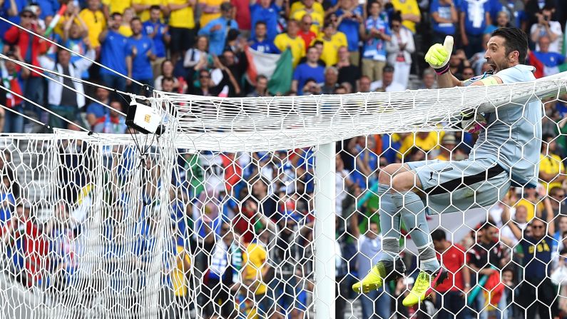 Goalkeeper Gianluigi Buffon celebrates after Italy defeated Sweden 1-0 in Toulouse, France. With the victory, Italy assured itself a spot in the knockout stage.