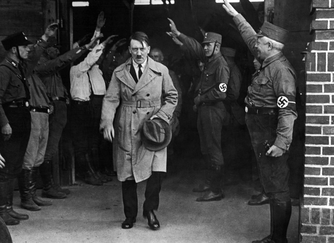 Hitler, then leader of the National Socialists, leaves the party's Munich headquarters in December 1931.