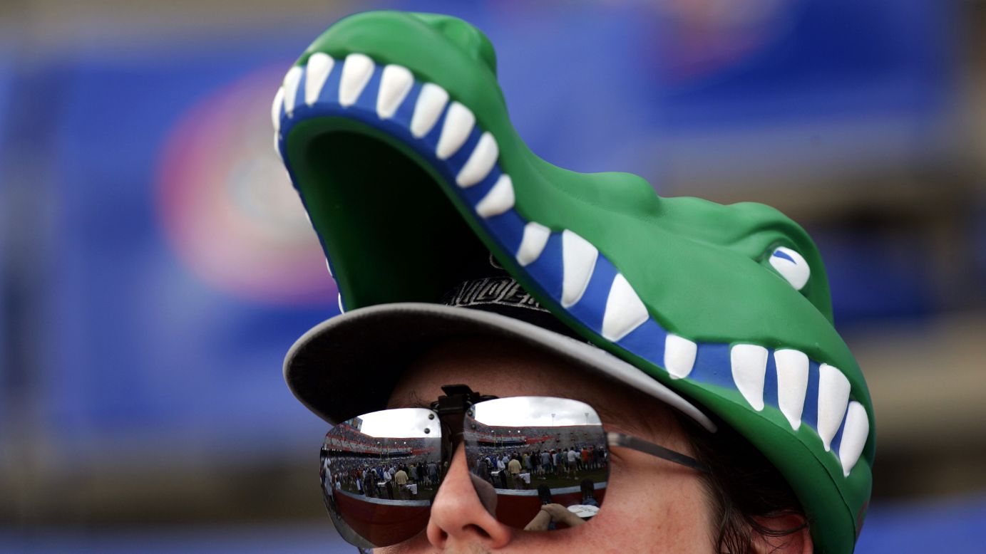 A University of Florida fan wears a gator hat at a football game in 2005.