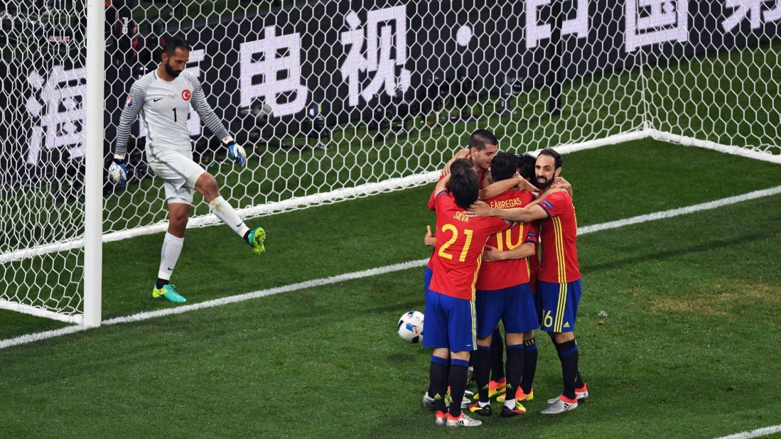 Spanish players celebrate after Alvaro Morata's second goal gave them a 3-0 lead over Turkey on Friday, June 17. Spain cruised to victory and clinched a spot in the tournament's knockout stage.