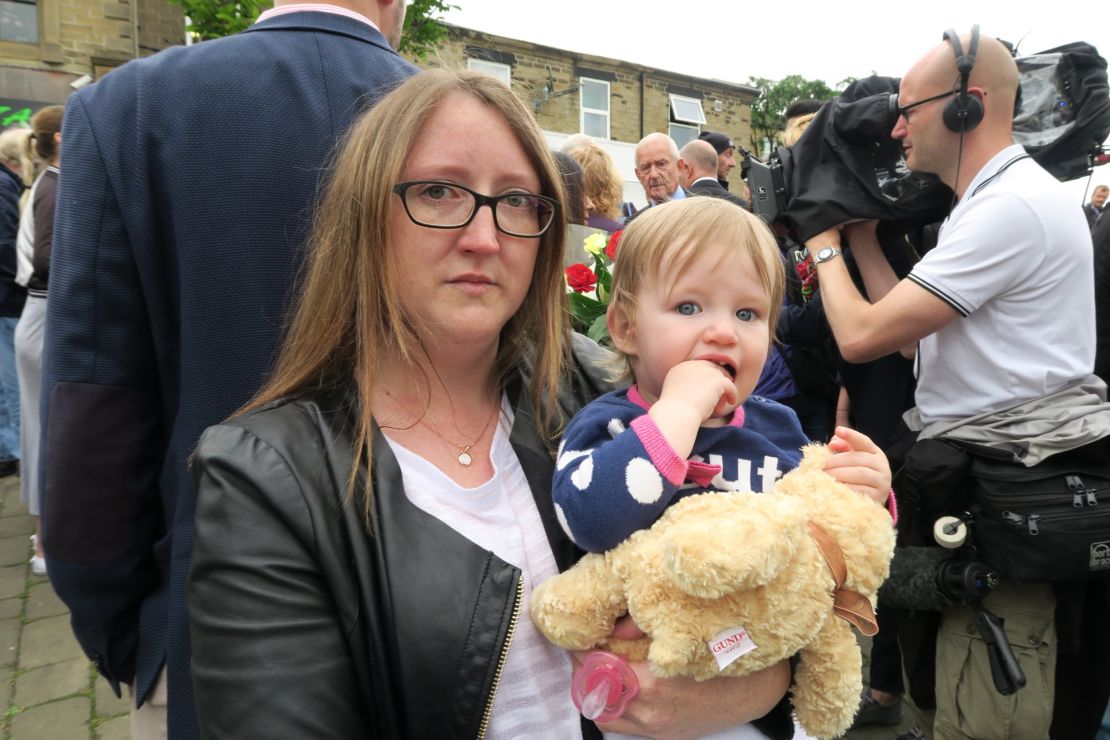 Laura Woodbridge and her daughter Lyla came to leave flowers at the makeshift memorial to Jo Cox.