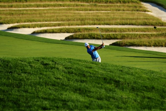 Dustin Johnson hits a shot on the third hole during the second round on Friday, June 17.