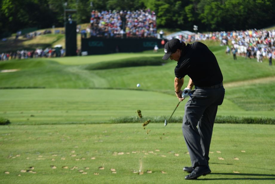 Phil Mickelson hits his tee shot on the sixth hole during the second round on June 17.