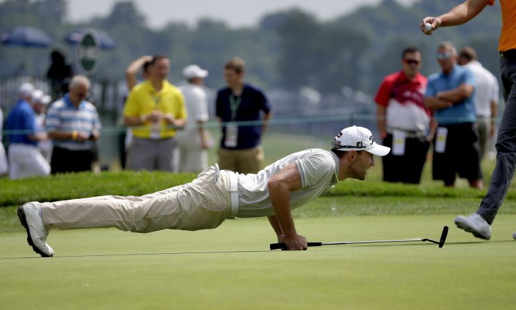 Max Kieffer of Germany lines up his putt on the 18th hole during the rain delayed first round on June 17.