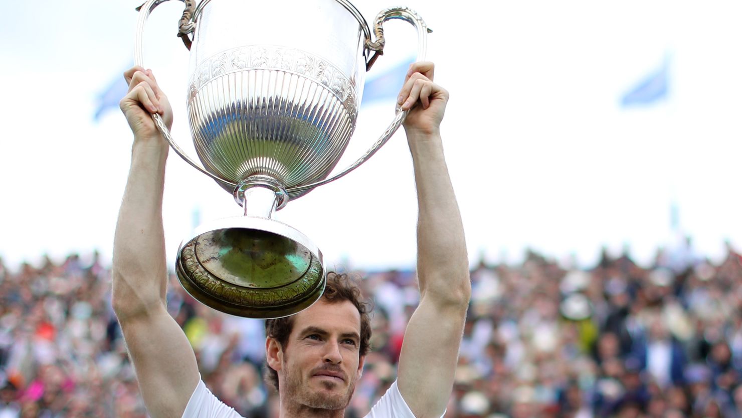 Just champion: Andy Murray lifts the famous Queen's Club trophy for a record fifth time. 