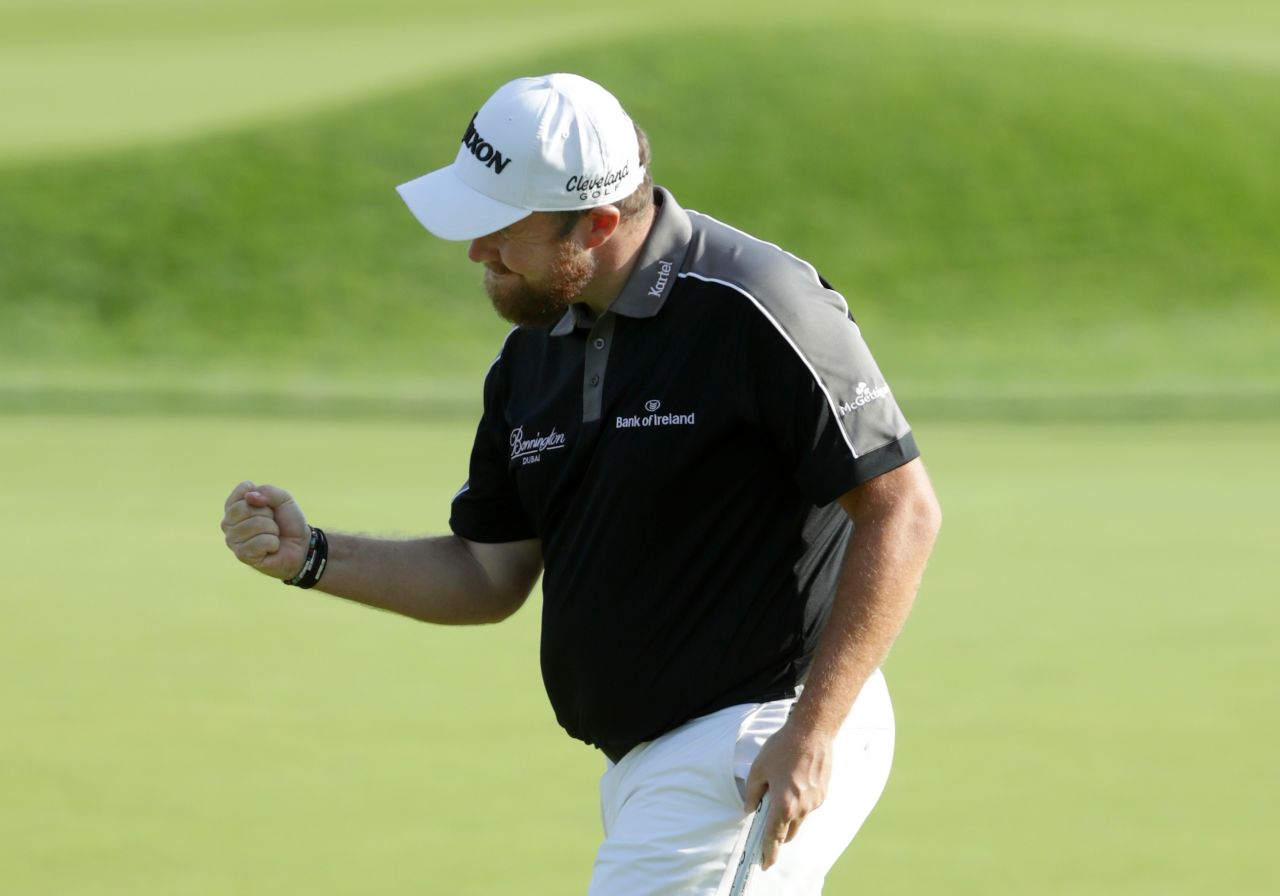 Shane Lowry celebrates his putt on the 18th during the third round on June 19. 