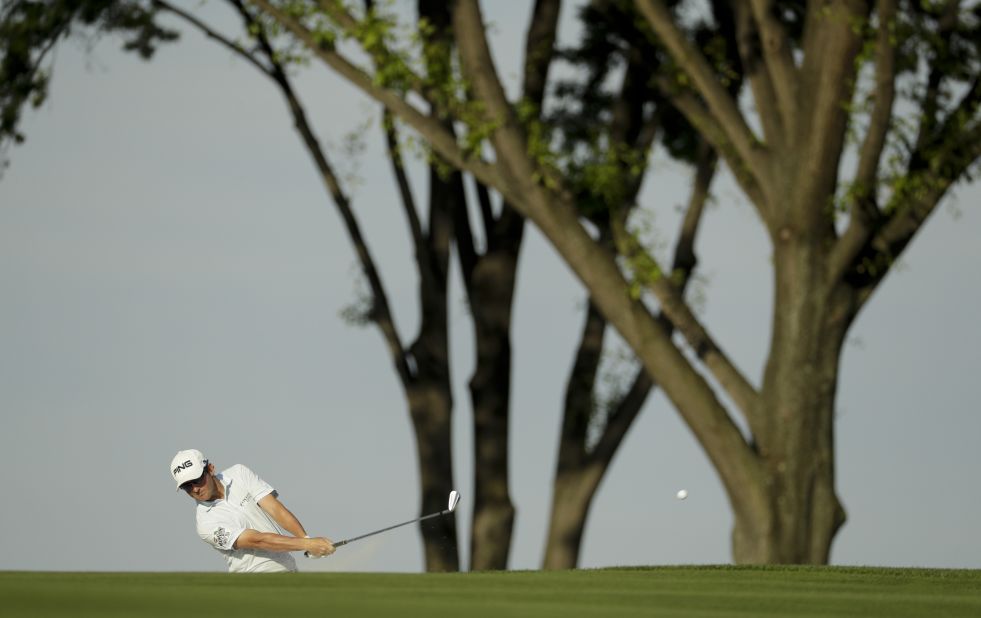 Andrew Landry hits from the fairway on the 15th hole on June 19.