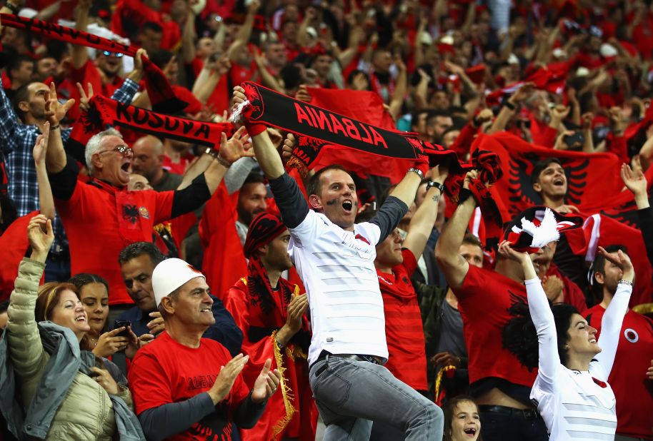 Albania supporters celebrate their team's  goal against Romania on Sunday in Lyon, France. Albania defeated Romania 1-0.