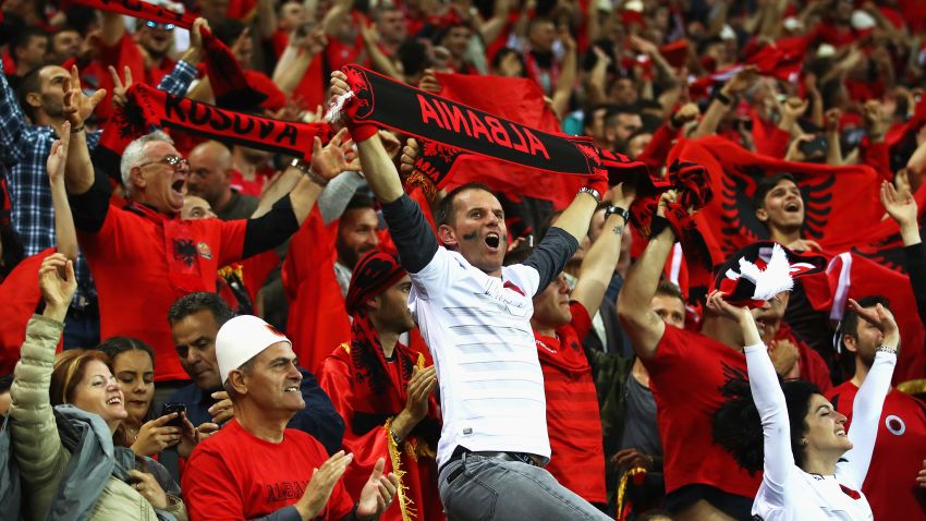 LYON, FRANCE - JUNE 19: Albania supporters celebrate their team's first goal during the UEFA EURO 2016 Group A match between Romania and Albania at Stade des Lumieres on June 19, 2016 in Lyon, France.  (Photo by Clive Brunskill/Getty Images)